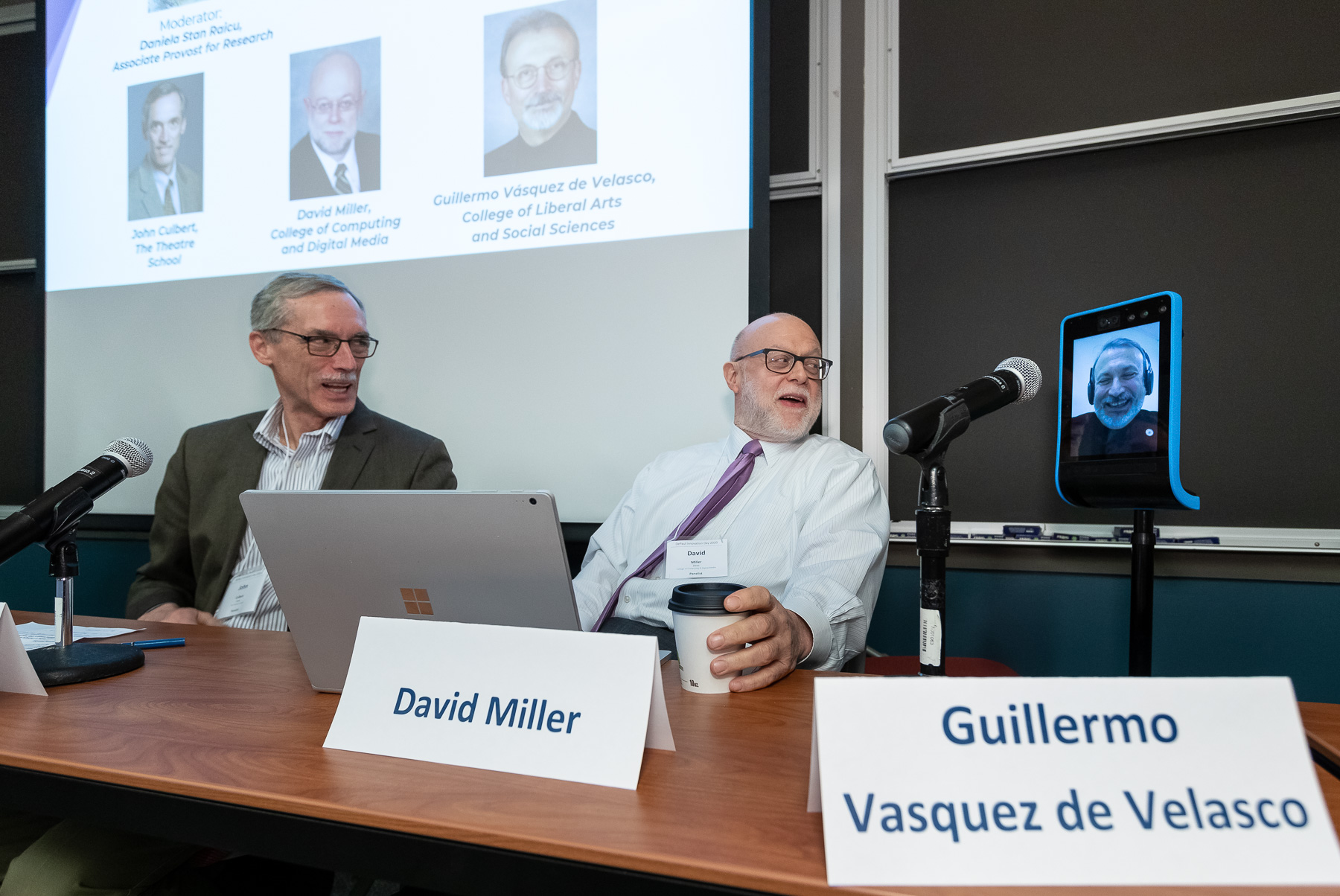 John Culbert, dean of The Theatre School, left, and David Miller, dean of the College of Computing and Digital Media, center, hosted a panel discussion along with Guillermo Vásquez de Velasco, dean of the College of Liberal Arts and Social Sciences, who participated via a telepresence robot. (DePaul University/Jeff Carrion)